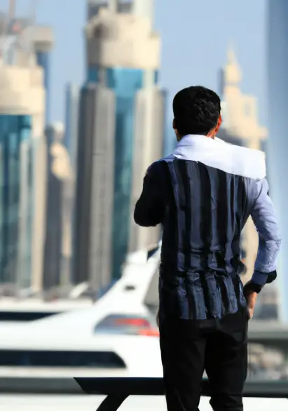 standing in dubai with smart dress code
